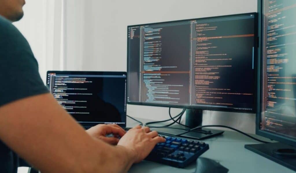 Closeup young man software developer